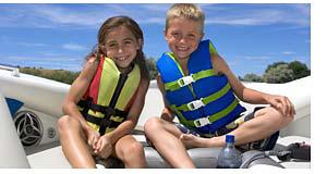 Kids in the Front of a Deck Boat